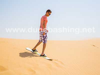 sandboarding in dubai desert